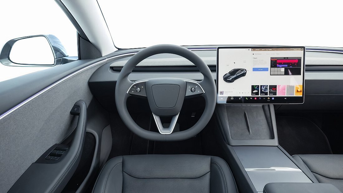 Tesla Model 3 Long Range AWD (2023-…) interior, front seat, driver seat, dashboard, steering wheel, infotainment, cockpit