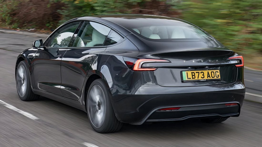Tesla Model 3 Long Range RWD (2024-…) rear quarter photo, three-quarter view, diagonal, exterior