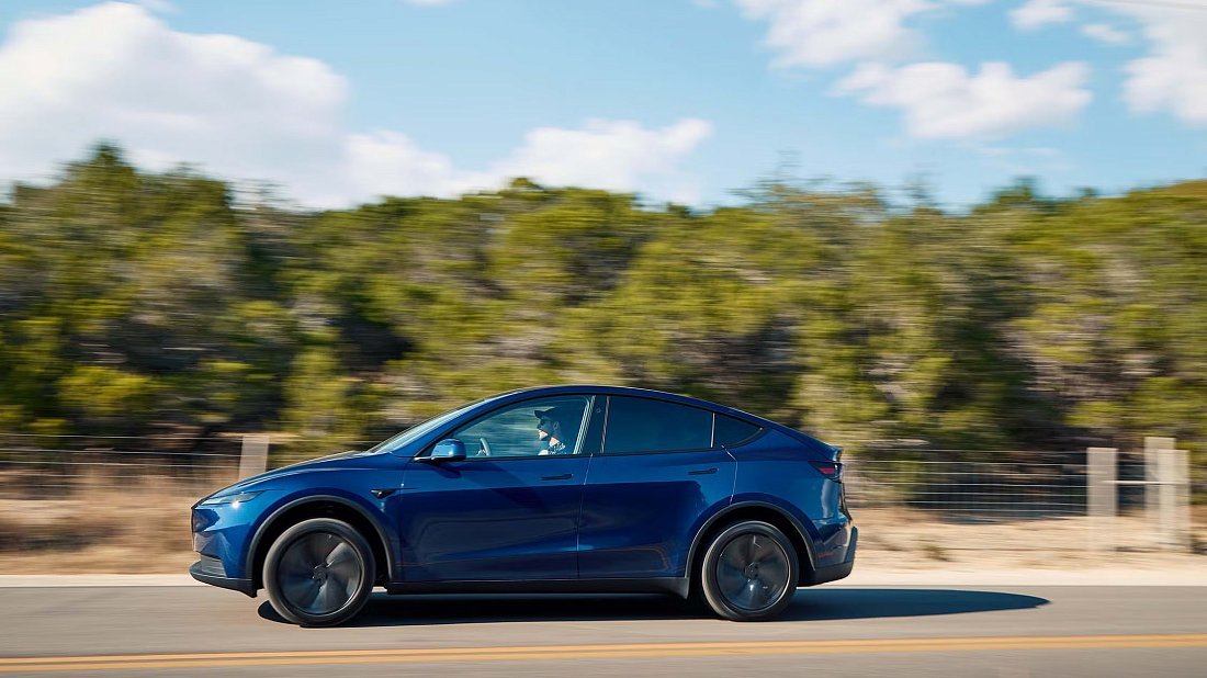 Tesla Model Y Standard RWD (2025-...) side profile photo, silhouette, doors, wheels, exterior