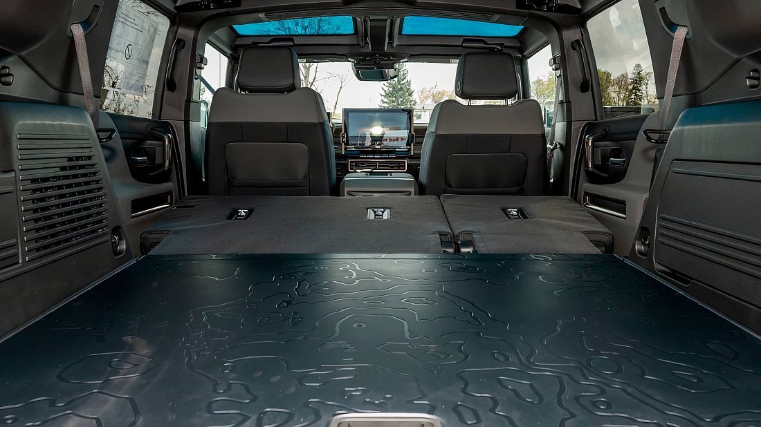 GMC Hummer EV SUV 2X (2024-…) folded trunk photo, boot, expanded, folded seats, maximum volume, max cargo, max capacity, max storage