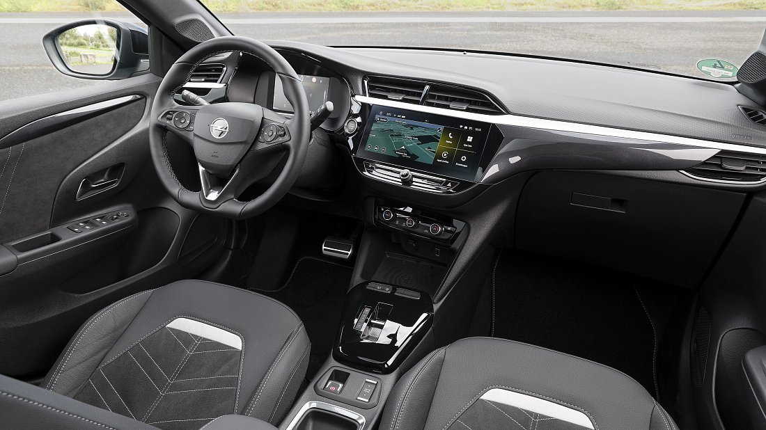 Opel Corsa Electric 54 kWh (2025-…) interior photo, front seat, driver seat, dashboard, steering wheel, infotainment, cockpit