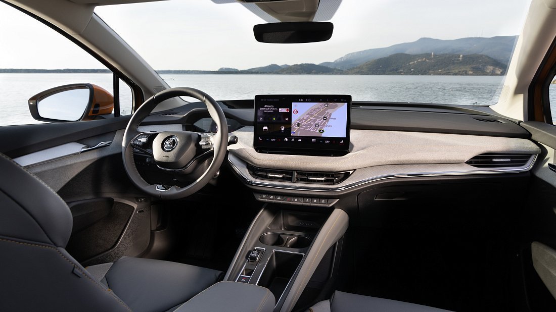 Škoda Enyaq Coupe 85 (2023-2025) interior, front seat, driver seat, dashboard, steering wheel, infotainment, cockpit