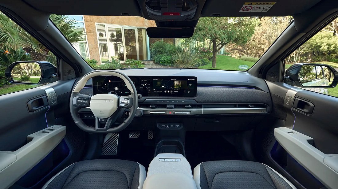 Kia EV3 Standard Range (2024-…) interior, front seat, driver seat, dashboard, steering wheel, infotainment, cockpit