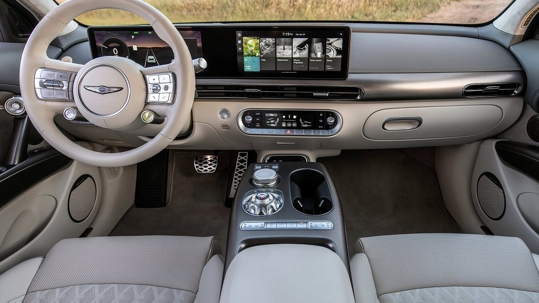 Genesis GV60 Standard AWD (2024-…) interior, front seat, driver seat, dashboard, steering wheel, infotainment, cockpit