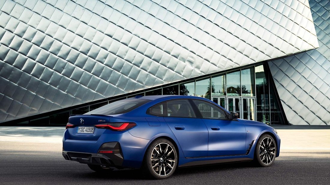 BMW i4 M50 (2021-2024) rear quarter, three-quarter view, diagonal, exterior