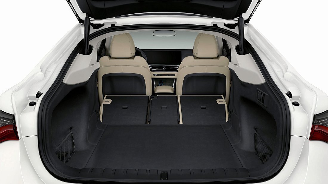 BMW i4 eDrive40 (2021-2024) folded trunk photo, boot, expanded, folded seats, maximum volume, max cargo, max capacity, max storage