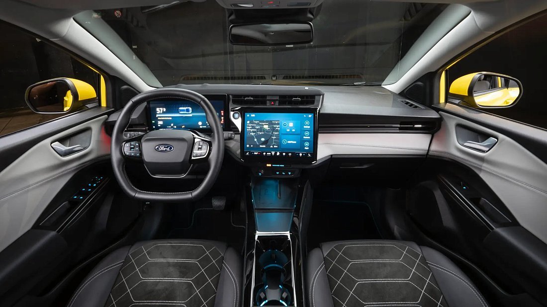 Ford Puma Gen-E FWD (2024-…) interior photo, front seat, driver seat, dashboard, steering wheel, infotainment, cockpit