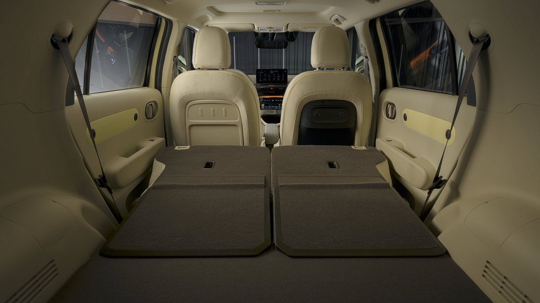 Hyundai Casper (Inster) Electric Long Range (2024-...) folded trunk photo, boot, expanded, folded seats, maximum volume, max cargo, max capacity, max storage