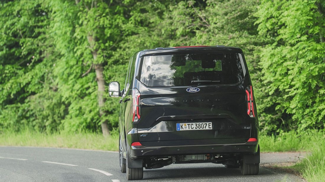 Ford e-Tourneo Custom L1 210 kW (2024-...) rear view, taillights, trunk, spoiler, badge, bumper, exterior