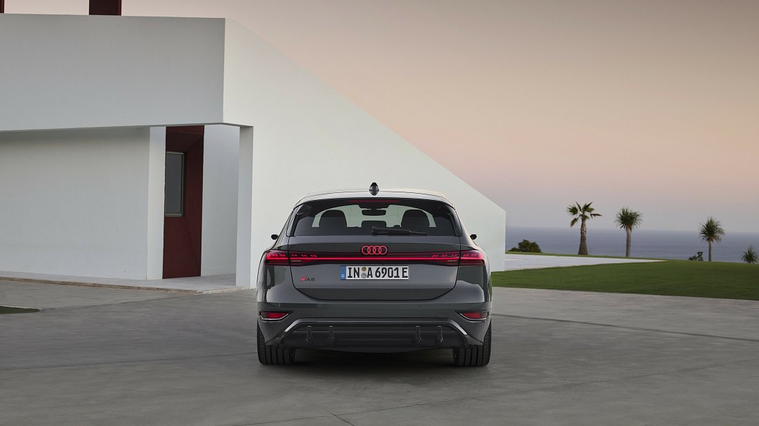 Audi A6 Avant e-tron quattro (2024-…) rear view, taillights, trunk, spoiler, badge, bumper, exterior
