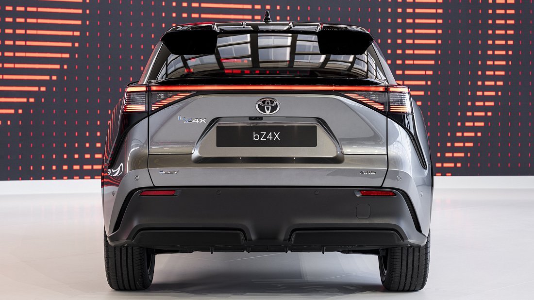 Toyota bZ4X (bZ) AWD (2025-…) rear view, taillights, trunk, spoiler, badge, bumper, exterior
