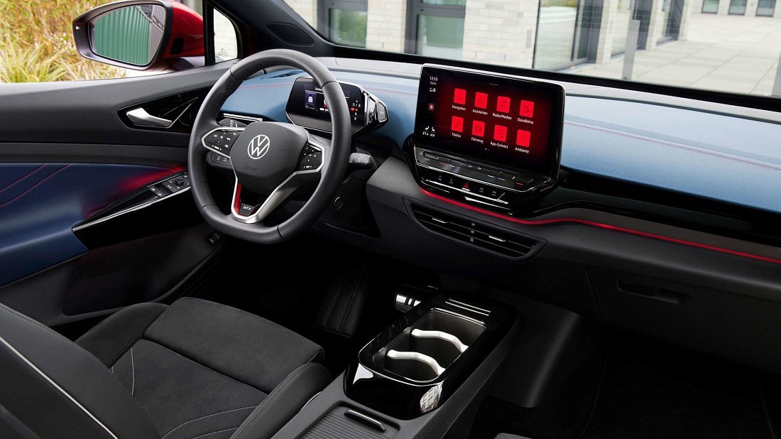 Volkswagen ID.4 GTX (2025-...) interior photo, front seat, driver seat, dashboard, steering wheel, infotainment, cockpit