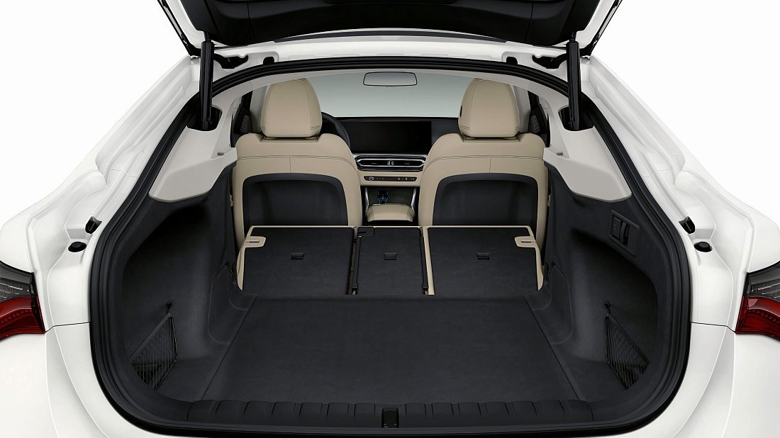 BMW i4 eDrive35 (2022-2024) folded trunk photo, boot, expanded, folded seats, maximum volume, max cargo, max capacity, max storage