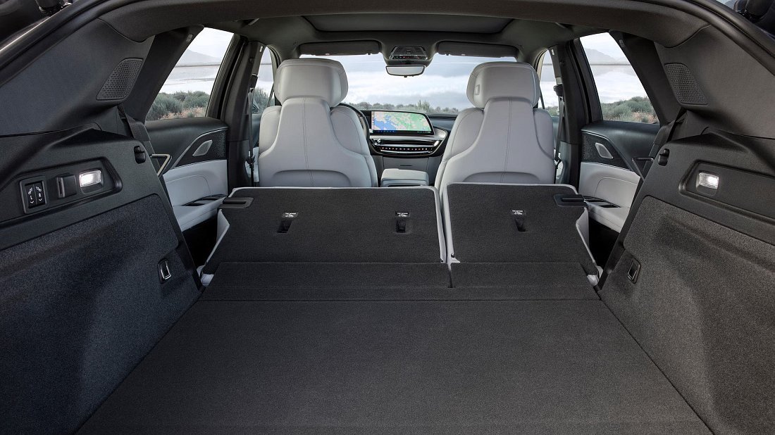 Cadillac Lyriq RWD (2022-…) folded trunk photo, boot, expanded, folded seats, maximum volume, max cargo, max capacity, max storage