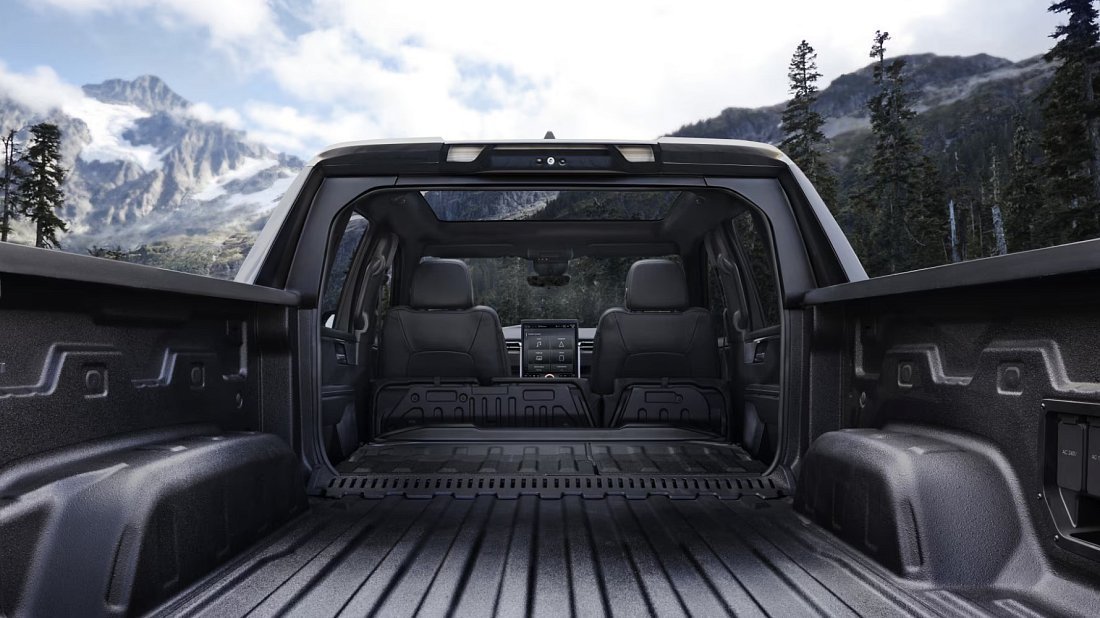 GMC Sierra EV Denali Edition 1 (2024-2025) folded trunk photo, boot, expanded, folded seats, maximum volume, max cargo, max capacity, max storage